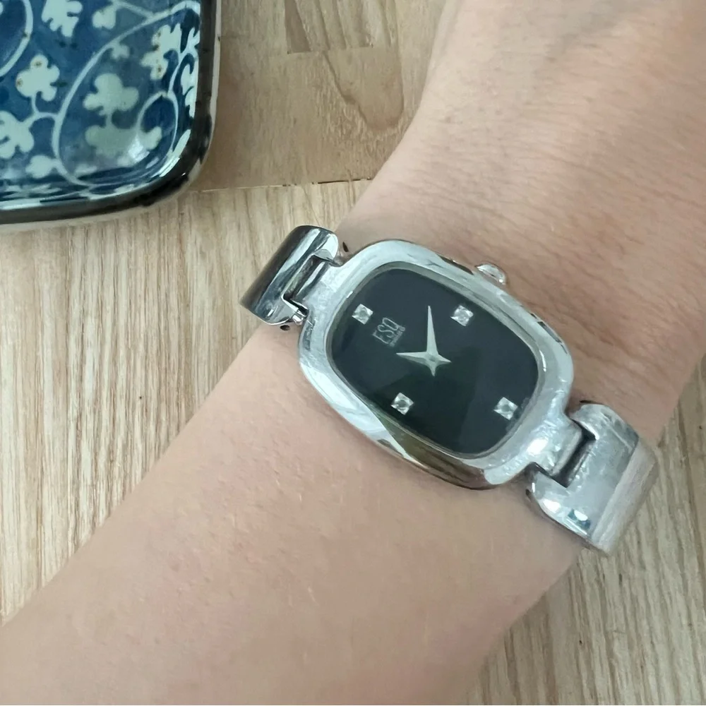 Esq by Movado ladies black dial silver tone dress watch NEW BATTERY